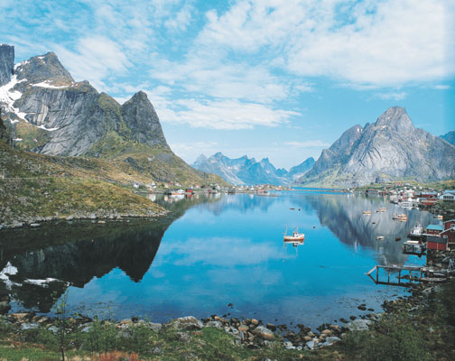 Lofoten islands view of Reine fishing village mountains fjord nature scenery, Norwegen